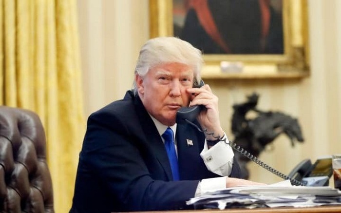 Justice Department to challenge judge`s halt of travel ban